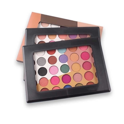 Paleta vacía del sombreador de ojos de Pantone con la impresión de seda del espejo