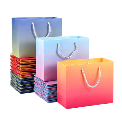 El efecto del holograma imprimió las bolsas de papel con la manija Pantone de la cinta